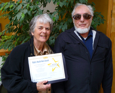 Jeanette & Bruce Trivis receive award on behalf of ECHHO volunteers.